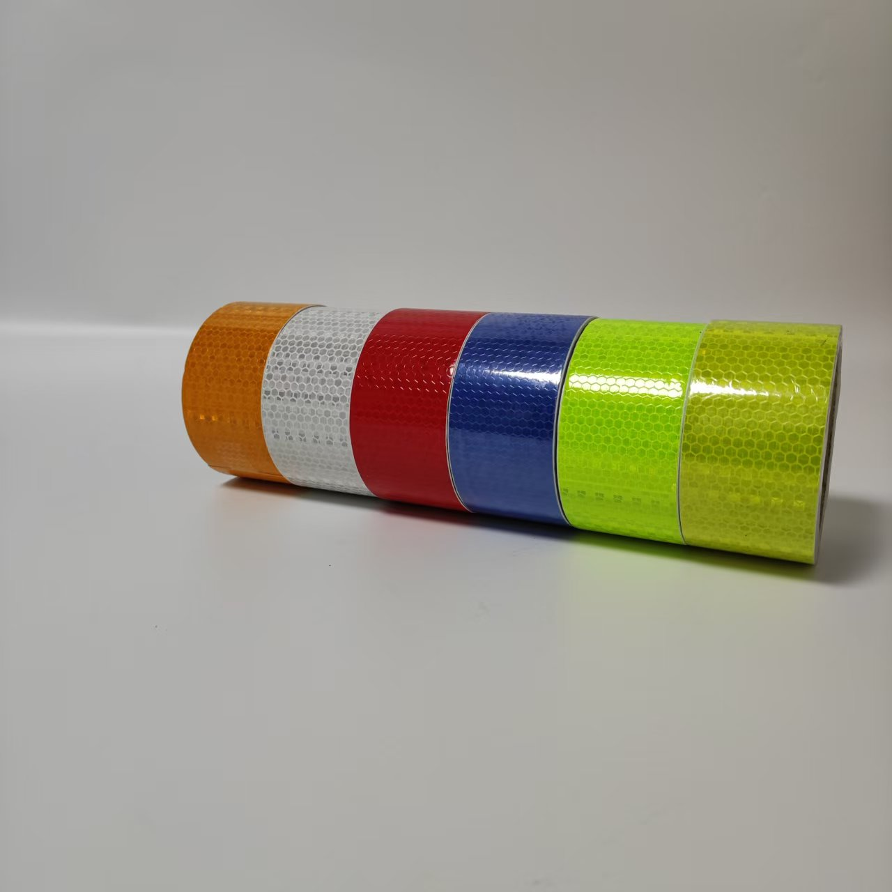 Colored prismatic reflective tape range laid side by side