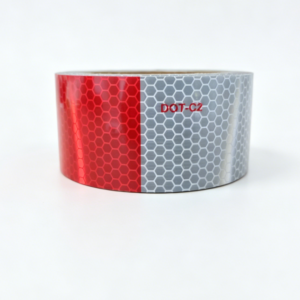 Metallized red and white DOT-C2 reflective conspicuity tape roll