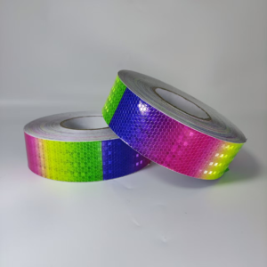 Two rainbow reflective warning tape rolls