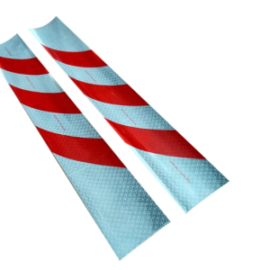 Red and white diagonal reflective marking tape strips