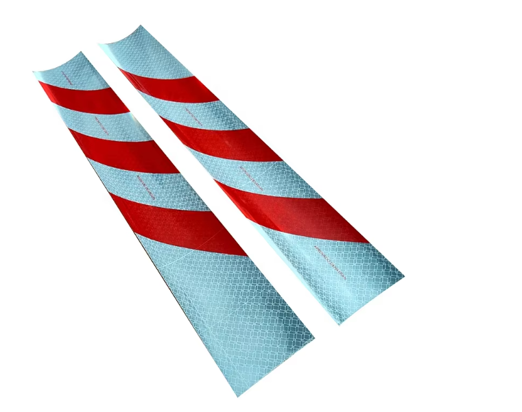 Red and white diagonal reflective marking tape strips