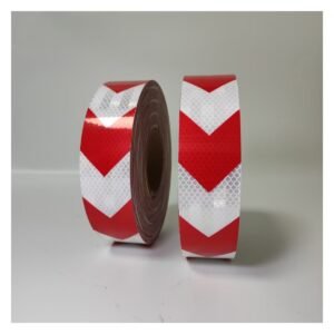 Red and white prismatic arrow reflective tape rolls
