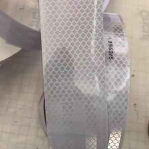 Prismatic reflective tape surface and backing detail