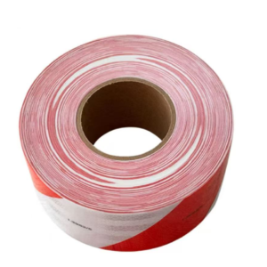 Red and white prismatic reflective tape roll top view