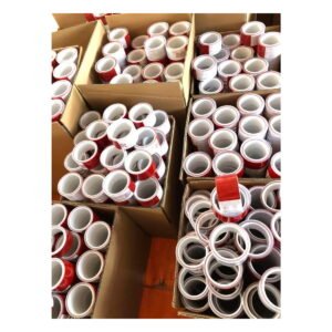 Red and white reflective tape rolls in bulk packing cartons
