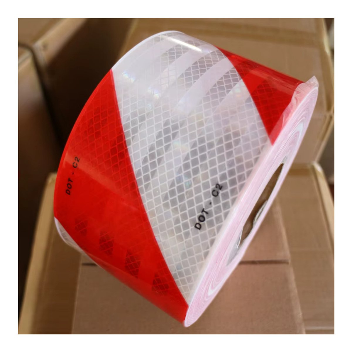 Diagonal red and white reflective tape pattern detail