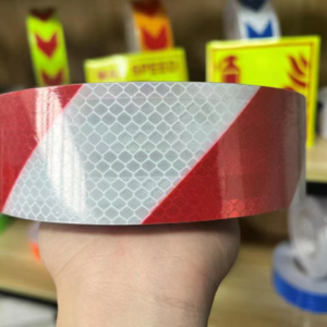 Red and white slant stripe reflective tape close-up