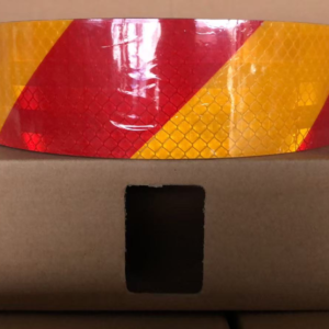 Red and yellow slant stripe reflective warning tape roll