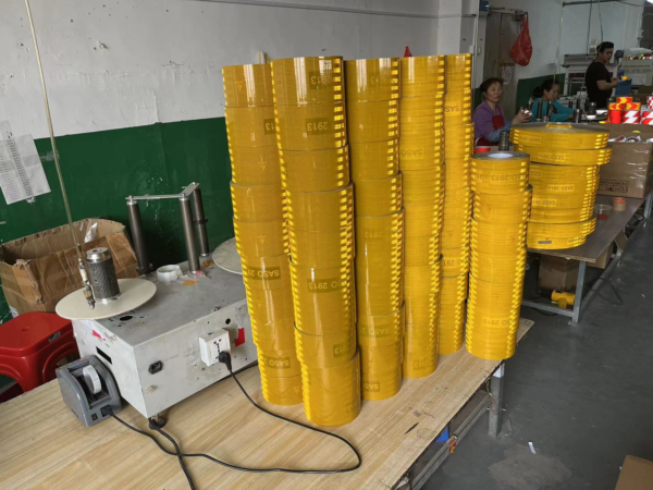Reflective tape rolls in the production area