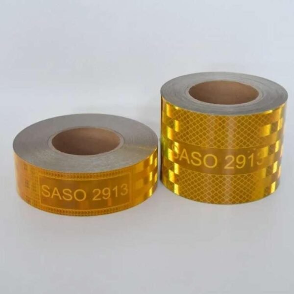Two yellow reflective tape rolls photographed in ambient light