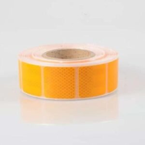 Yellow segmented reflective tape on a release liner
