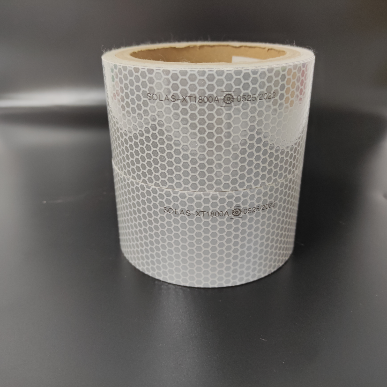 Silver honeycomb reflective tape roll close-up