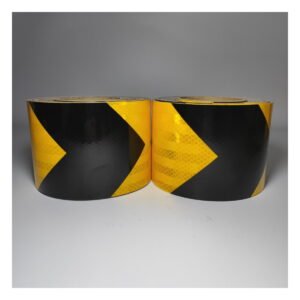 Yellow and black arrow reflective tape rolls