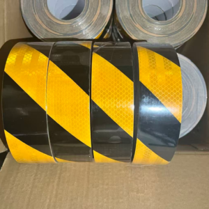 Yellow and black slant stripe reflective tape rolls in carton