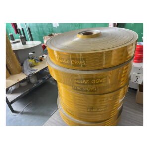 Yellow reflective material rolls in the workshop