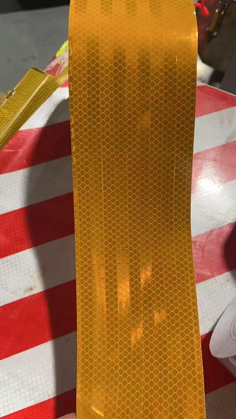 Yellow reflective tape surface detail