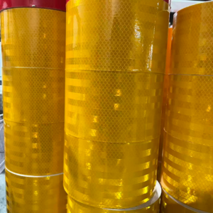 Yellow reflective warning tape rolls