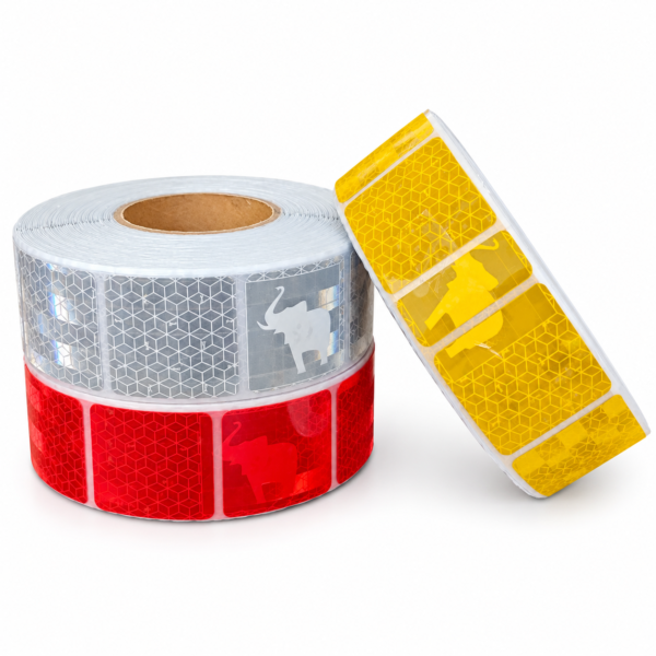 Silver white, red and yellow rolls of elephant-pattern reflective tape