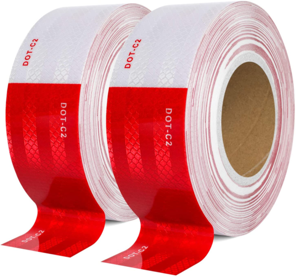 Two rolls of red and white microprismatic reflective truck marking tape
