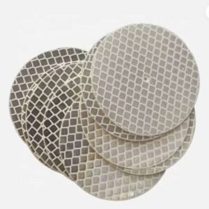Stacked circular white-silver reflective markers with visible center holes
