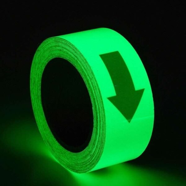 Photoluminescent directional arrow tape showing green afterglow