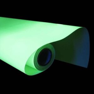 Partly unrolled photoluminescent film showing green afterglow