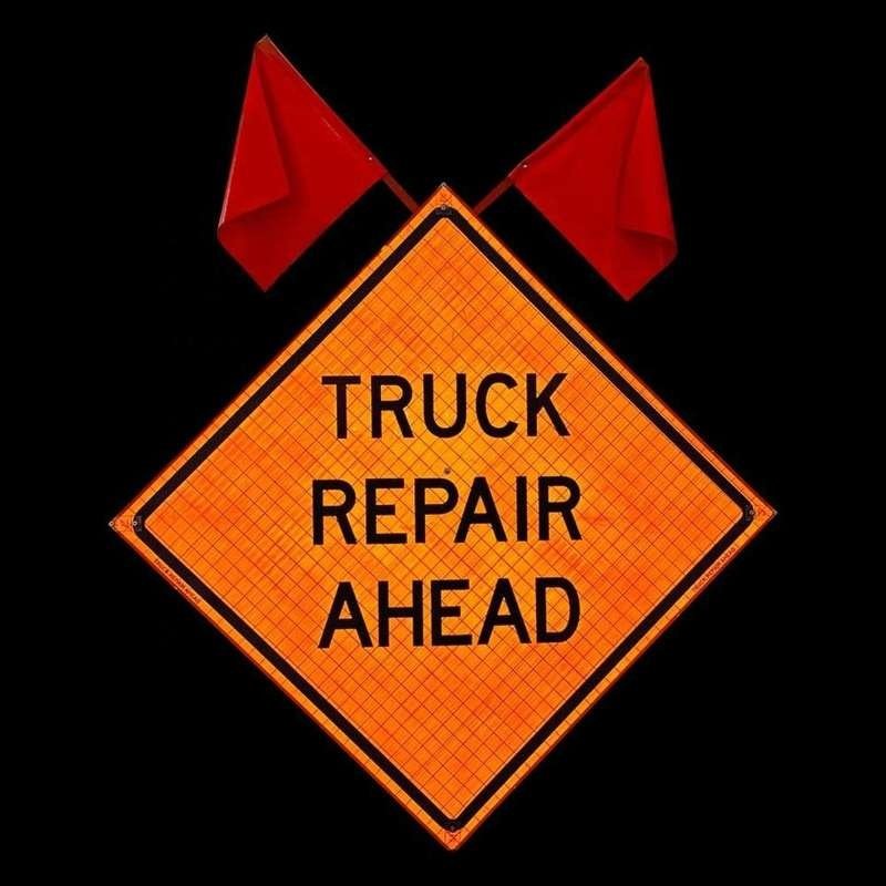 Truck Repair Ahead Roll-Up Sign with Flag Attachment — product detail