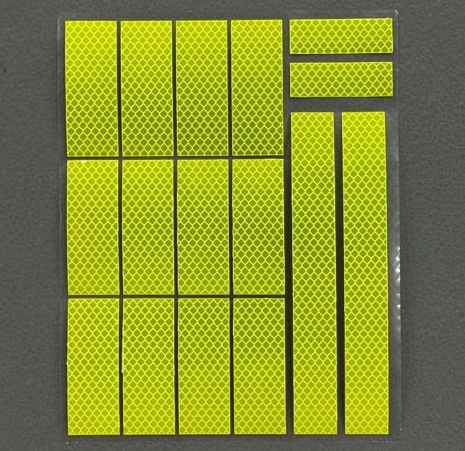 Fluorescent yellow reflective helmet and bicycle sticker sheet