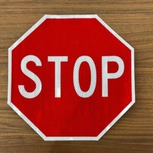 Octagonal red and white reflective STOP sign sticker
