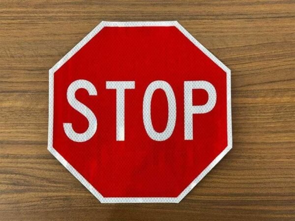 Octagonal red and white reflective STOP sign sticker