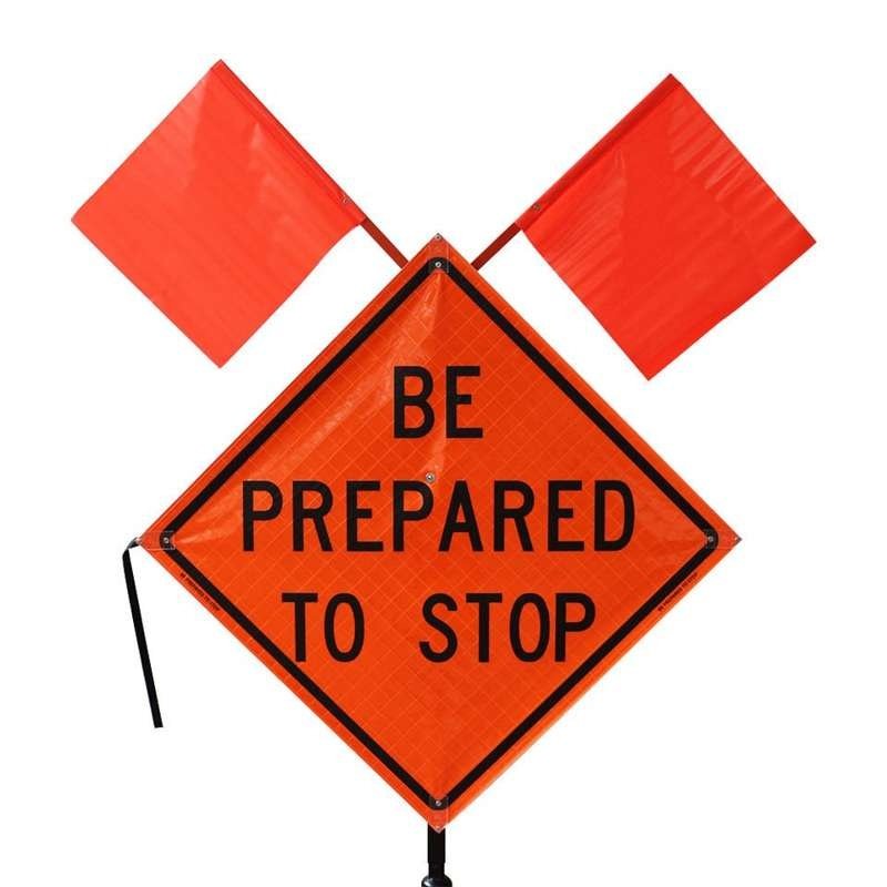Front detail of orange Be Prepared to Stop roll-up sign with twin flags