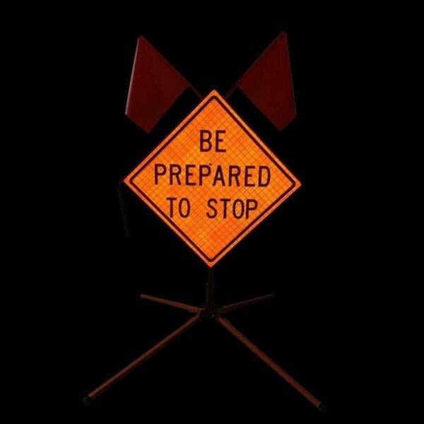 BE PREPARED TO STOP sign reflecting directed light in dark conditions