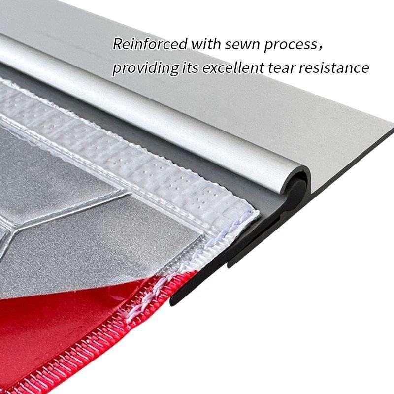 Sewn reflective tail lift flag edge and holder profile close-up