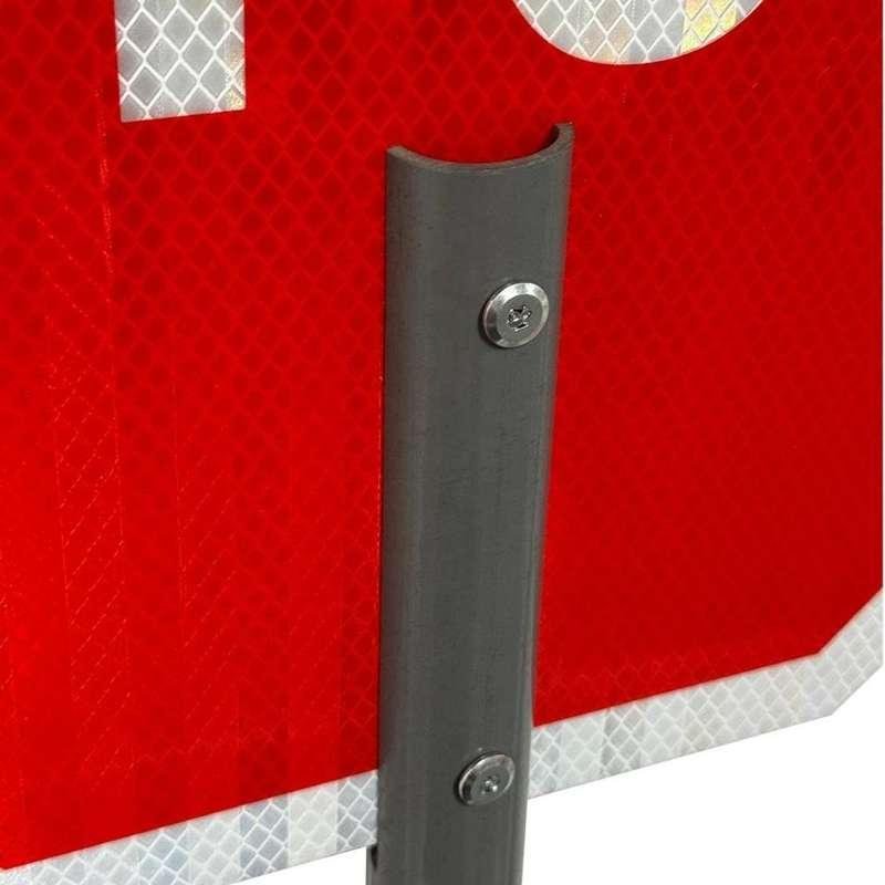 Screw-fastened aluminium handle on reflective STOP sign