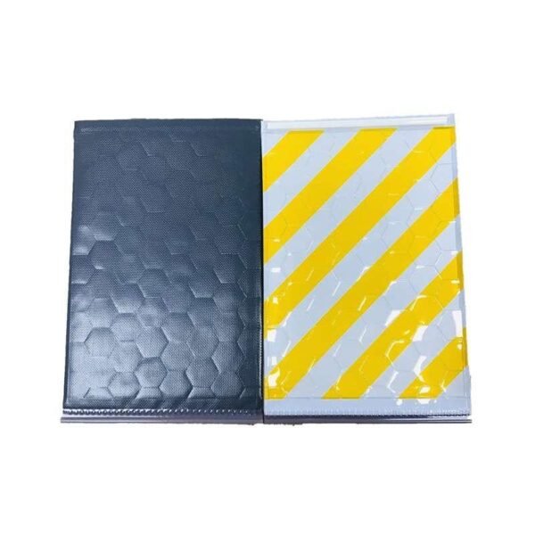 Front and back of yellow and white flexible tail lift warning flags