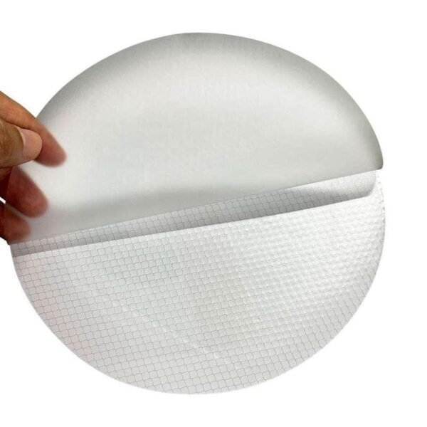 Peel-away liner on the back of reflective No Parking sticker
