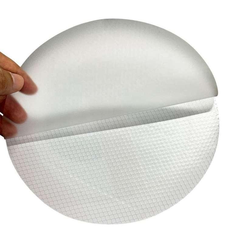 Peel-away liner on the back of reflective No Parking sticker
