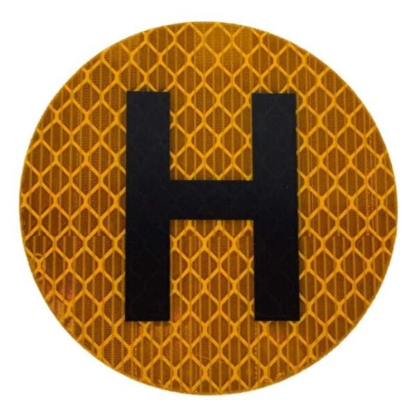 Round yellow reflective sticker with bold black H