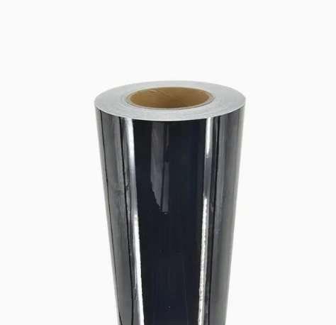 Close-up of black PVC film roll and cardboard core