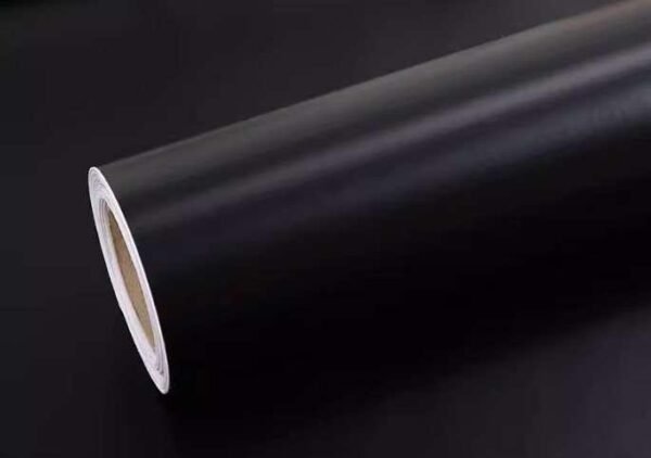Black sign-making film with light-colored release liner