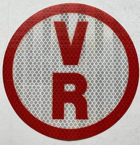 Circular V-R truss identification sticker with reflective white background