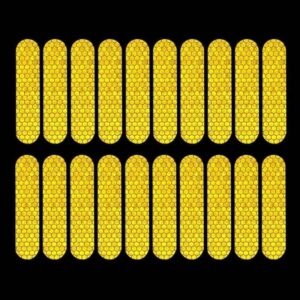 Twenty yellow reflective strips shown under directed illumination