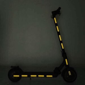 Yellow reflective strips applied to an electric scooter as an installation example