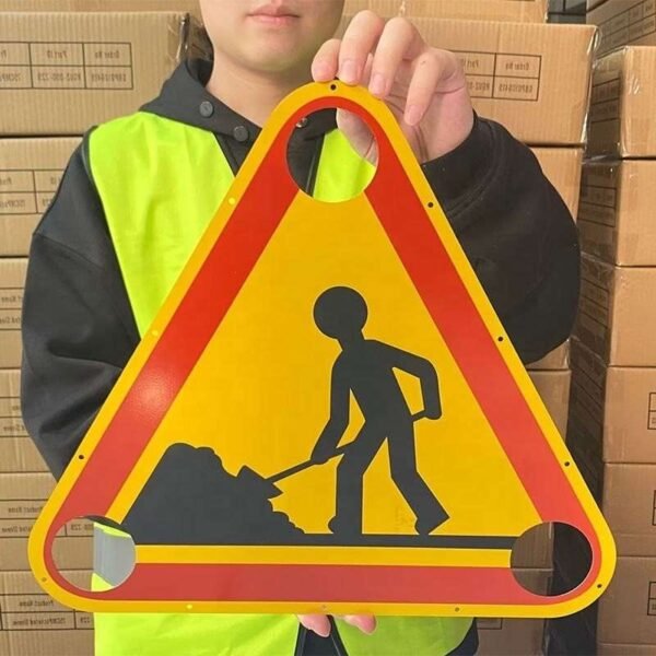 Hand-held triangular roadwork warning panel showing its outline and openings