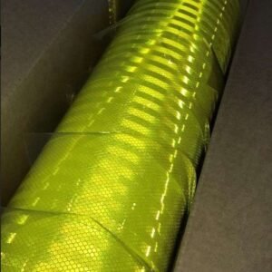 Fluorescent yellow prismatic reflective sheeting under directional light