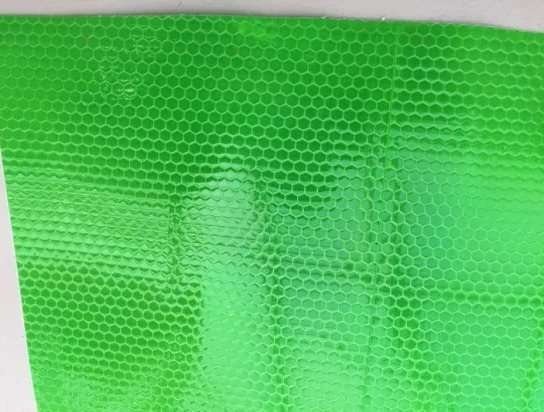 Green reflective PVC honeycomb surface detail