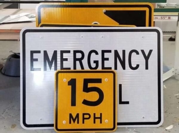 Printed reflective sign panels with black lettering and borders