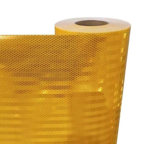 Yellow prismatic reflective film opened from the roll