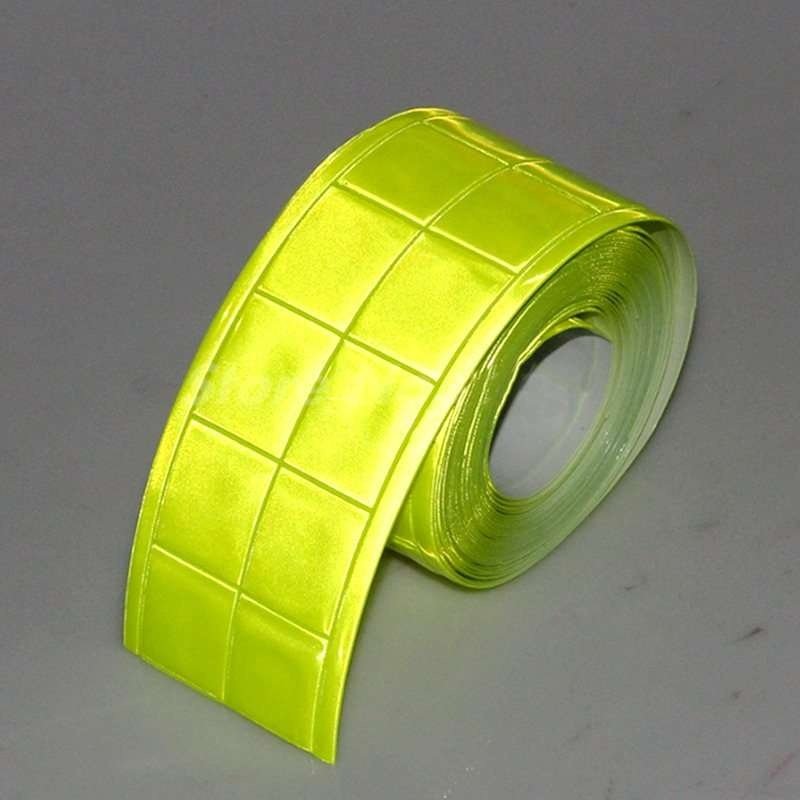 Lime PVC microprismatic sew-on reflective tape under illumination