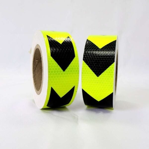 Fluorescent yellow and black chevron tape surface close-up